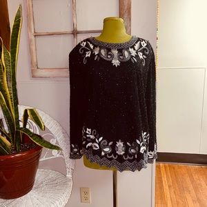 Plus size vintage beaded shirt.